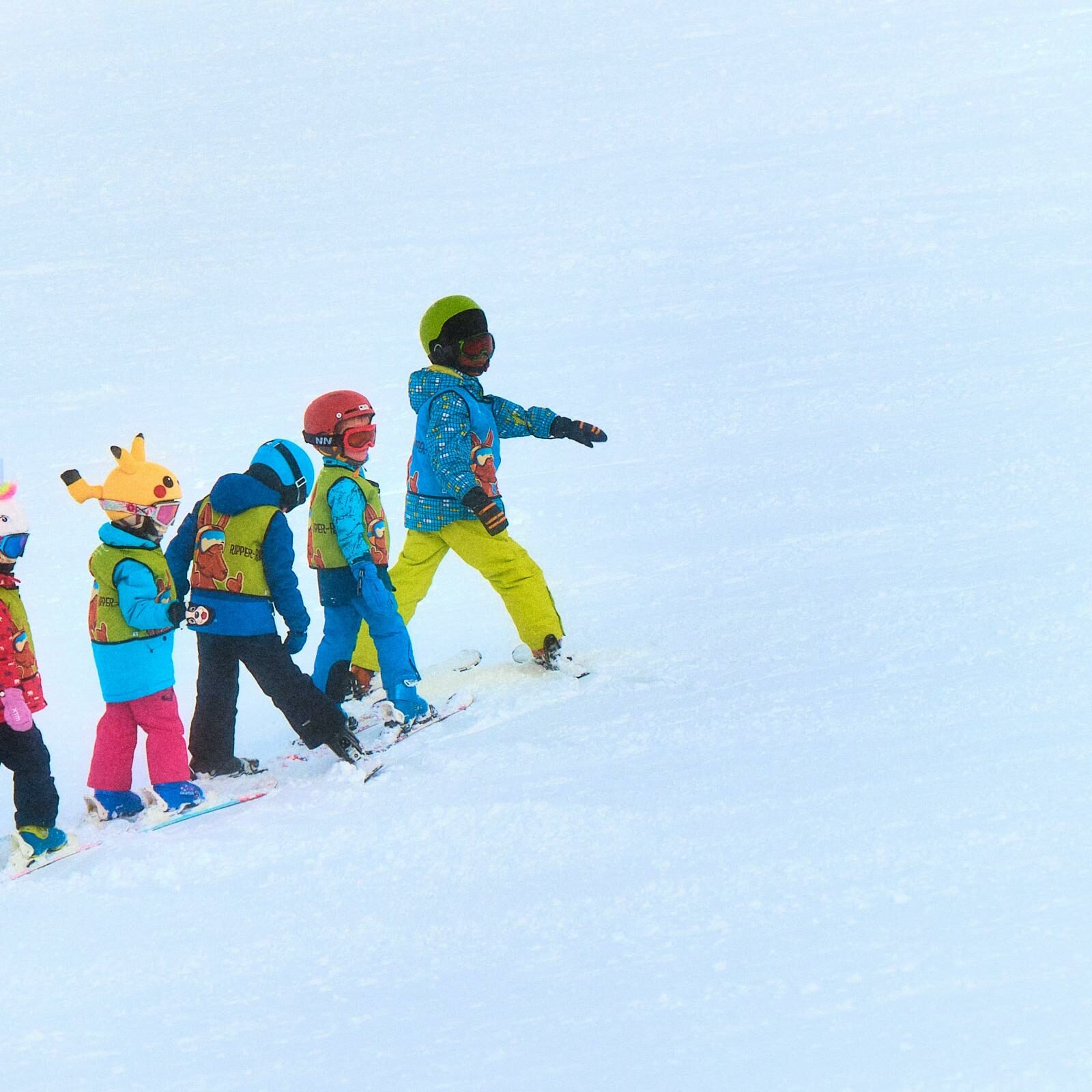 Kids learning to ski & snowboard